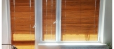 Drewniane żaluzje na okno balkonowe